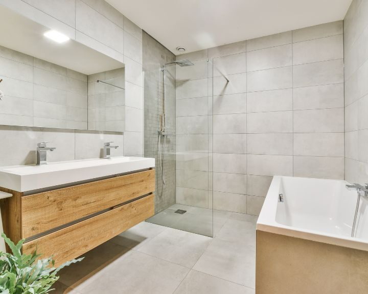 A city bathroom with a new sink and bathtub after remodels.