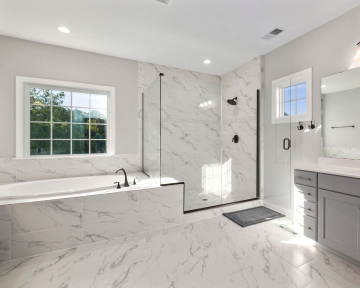 A city-style white tiled bathroom with a walk-in shower.